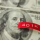 A red label printed 401K on top of a hundred dollar bill