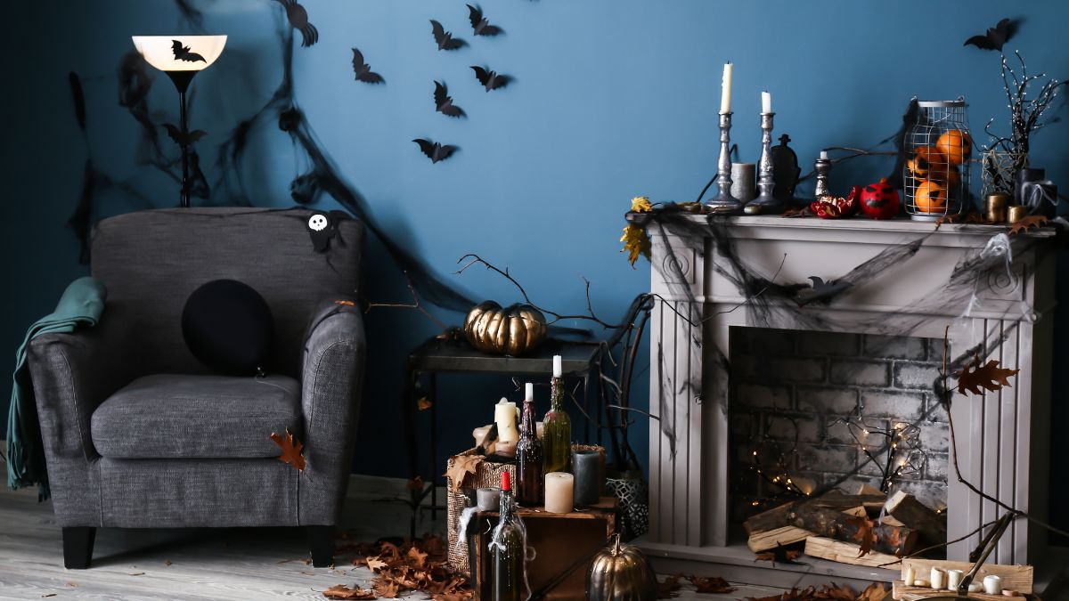 Chair and mantle setting with Halloween decor