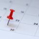 A red pin on the 30th day of a calendar month